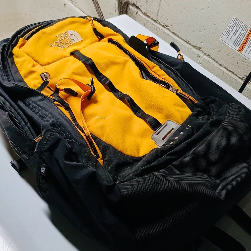 The North Face Men's Backpack in Black and Yellow